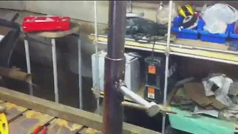 Самодельная телескопическая стойка для опирания длинных заготовок.